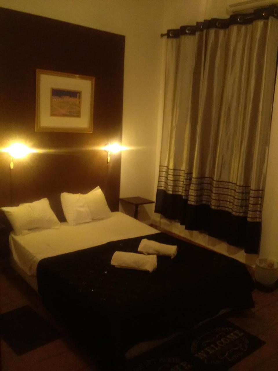 Black Cat Hostel อะซุนซิออง ภายนอก รูปภาพ