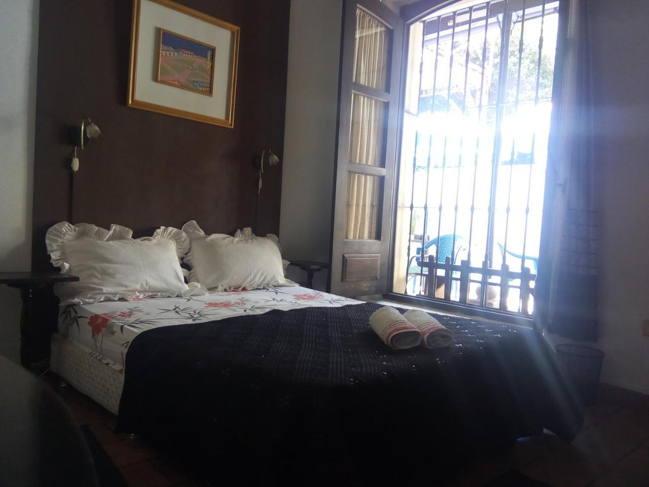 Black Cat Hostel อะซุนซิออง ภายนอก รูปภาพ